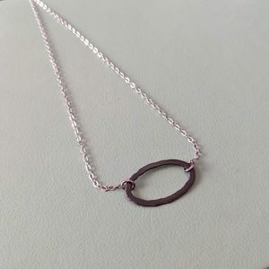 Sterling silver necklace with oxidized hammered oval pendant